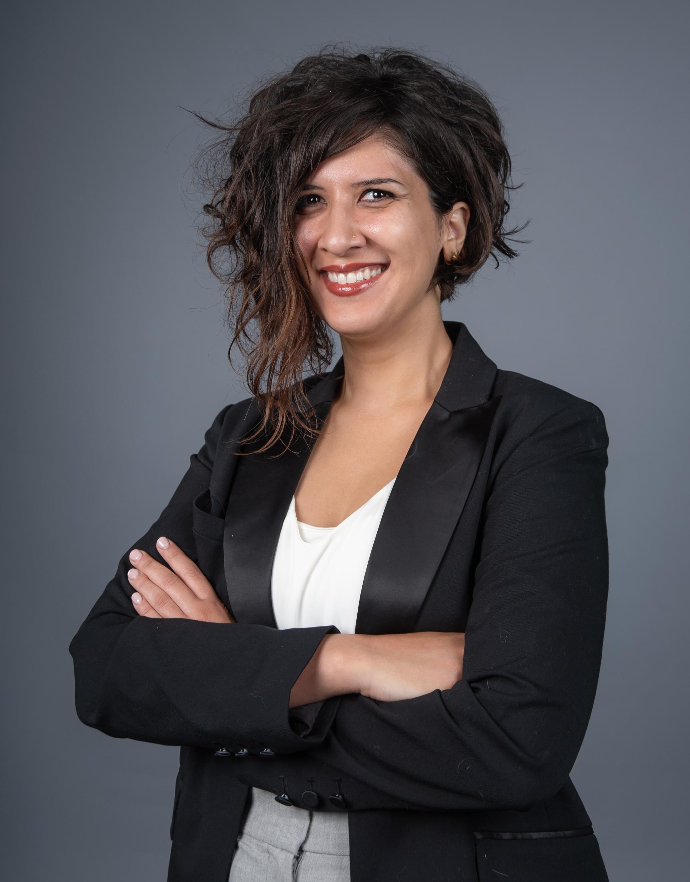 professional image of a woman on a grey background